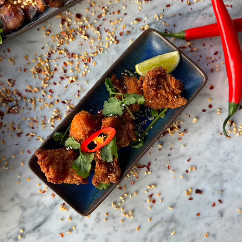 BangPop fried chicken w/ chilli, lime and Thai herbs
