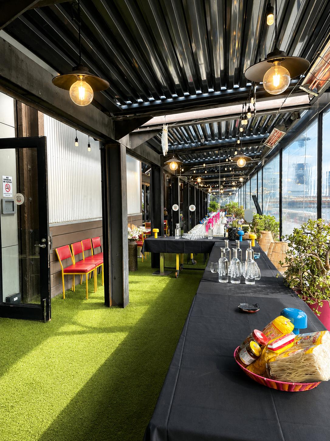 Tables arranged for an event on the TukTuk Nook Terrace